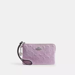 Coach Light Purple Embossed Wristlet With Coach Charm